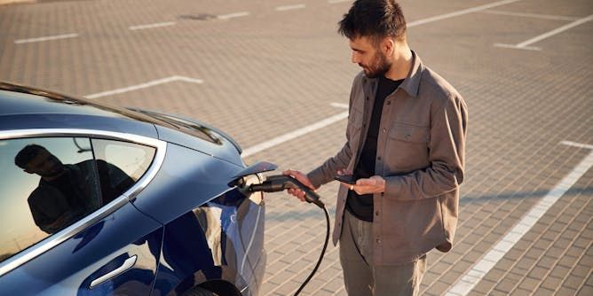 Electric vehicle owners to face pay-per-mile tax