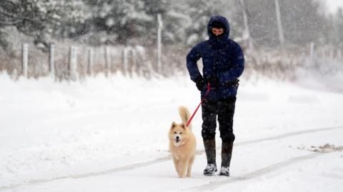 Ice warnings spread across parts of UK gripped by cold snap