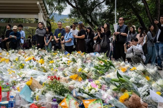 Hong Kong fire death toll rises to 146 as thousands pay respects