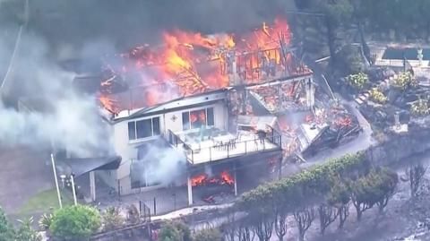 We've lost everything': Australia wildfire rips through homes