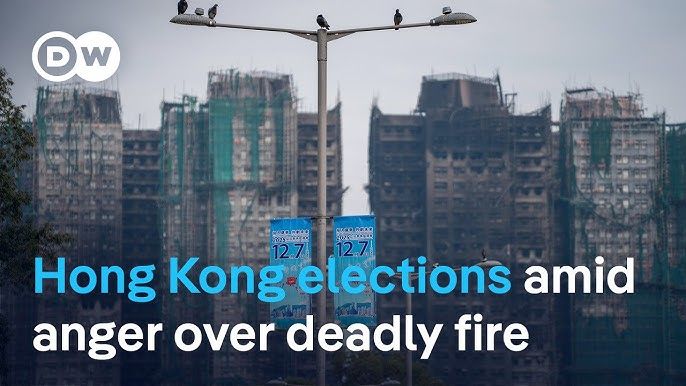 Hong Kong votes in election as city mourns deadly fire